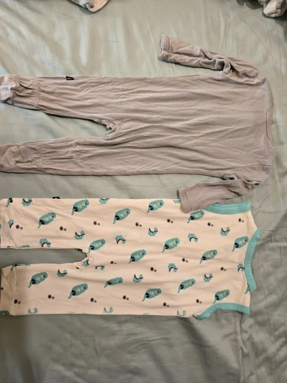 Kyte 3-6 month romper, pj, and an extra bamboo sleeper from Angel Baby